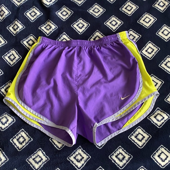 purple and yellow nike shorts